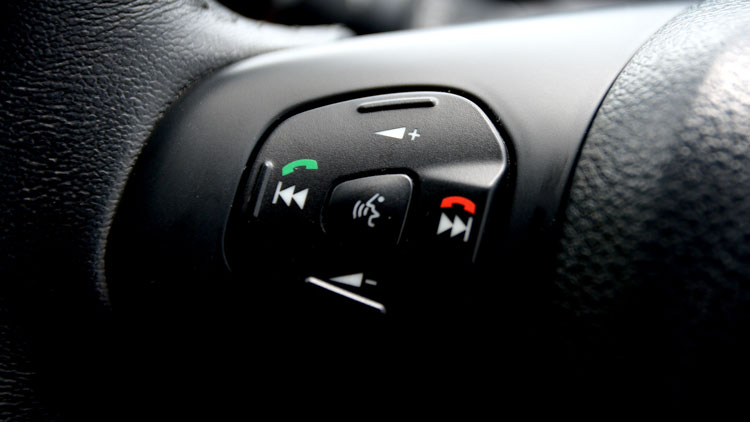 Bluetooth call controls on a car steering wheel
