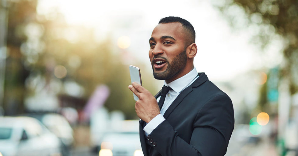 Man giving voice command to phone